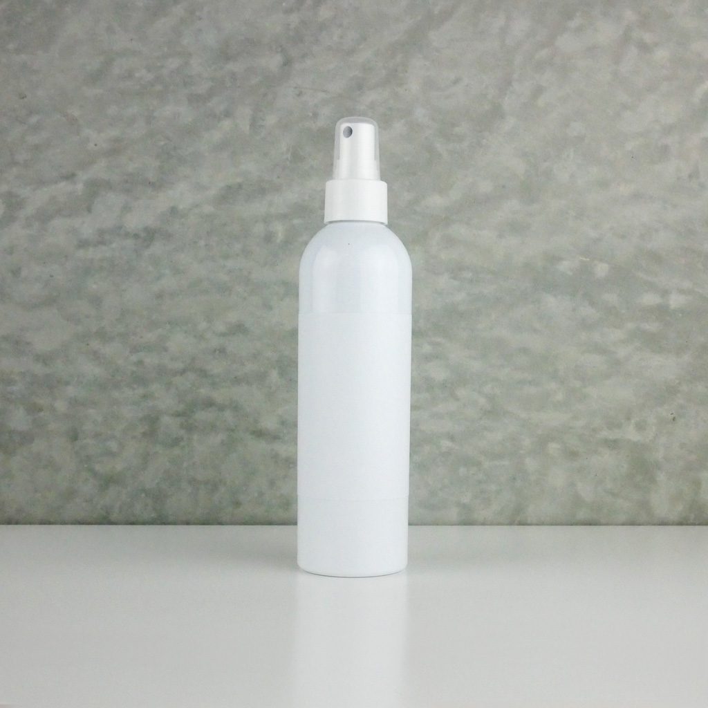 white-boston-with-spray-and-label